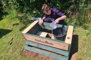 Image of student installing a BioScapes NatureArk at Bridgwater & Taunton College